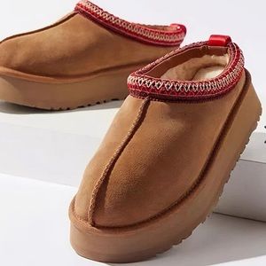 Brand New, Never Worn! Soled slippers